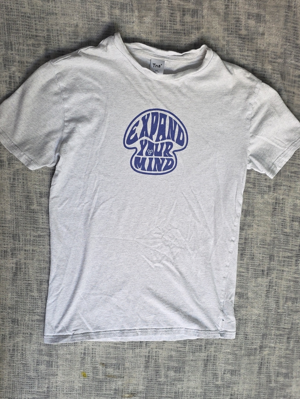 TNA White Tee with Blue 'Expand Your Mind' Graphic